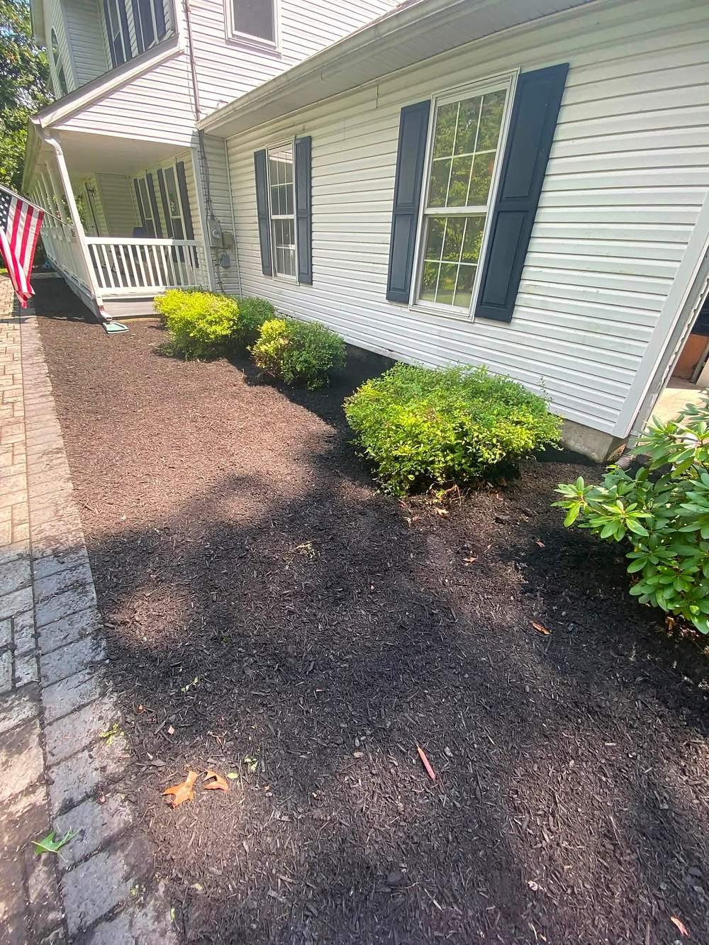Freshly mulched garden bed after landscaping service